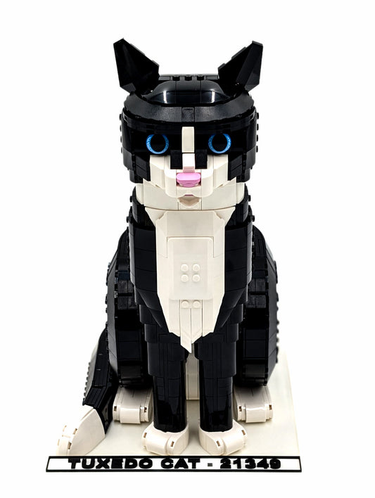 LEGO® Tuxedo Cat 21349 displayed on a white display stand, front view