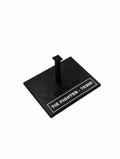 Black display stand for LEGO® Tie Fighter 75300, angled view without the model