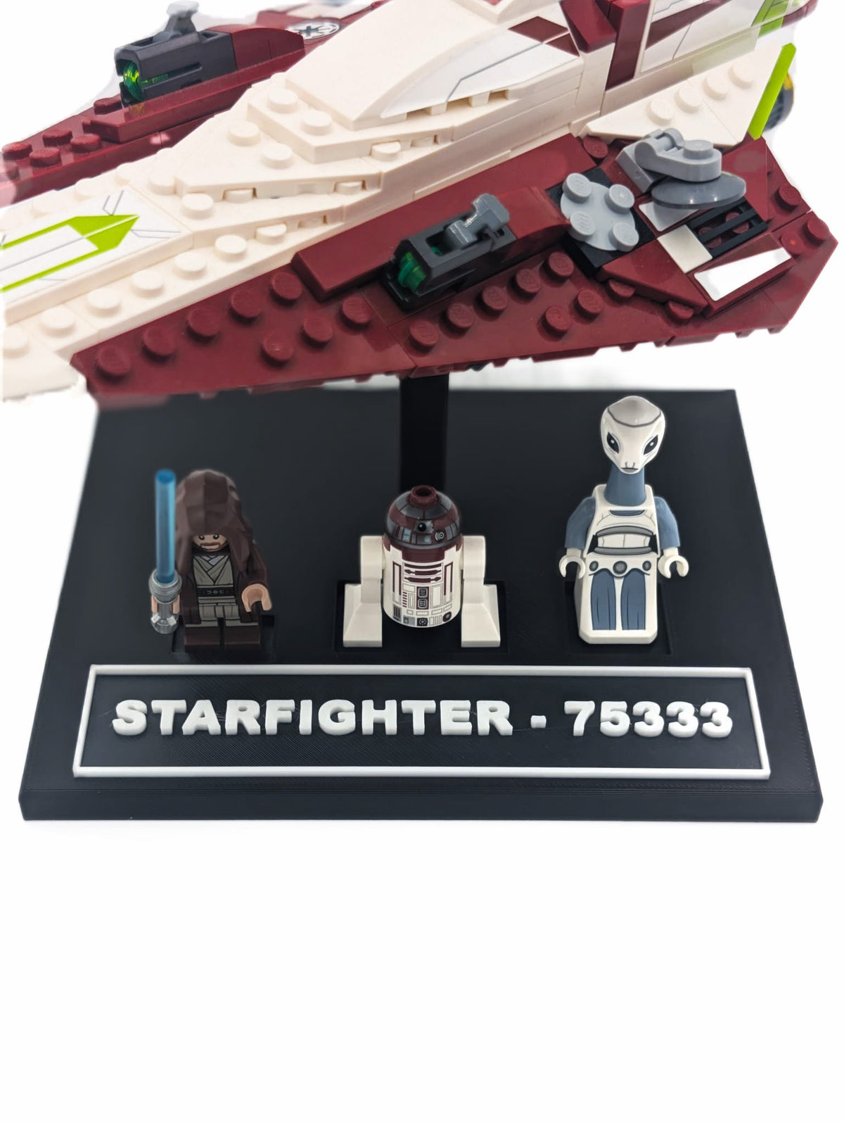 Black display stand for LEGO® Star Wars Obi-Wan Kenobi Jedi Starfighter 75333, shown with the model